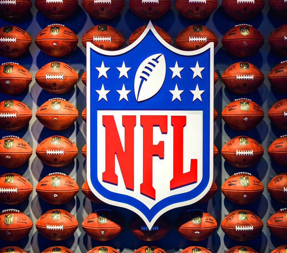NFL Shield Logo With Footballs